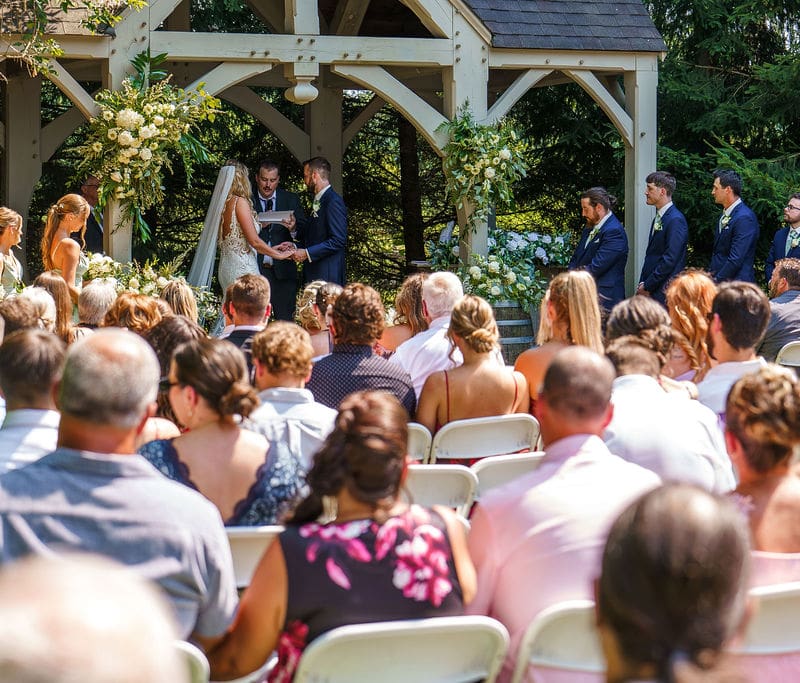 2025 wedding reception at Bellamere Winery featuring floral ceiling and countryside charm