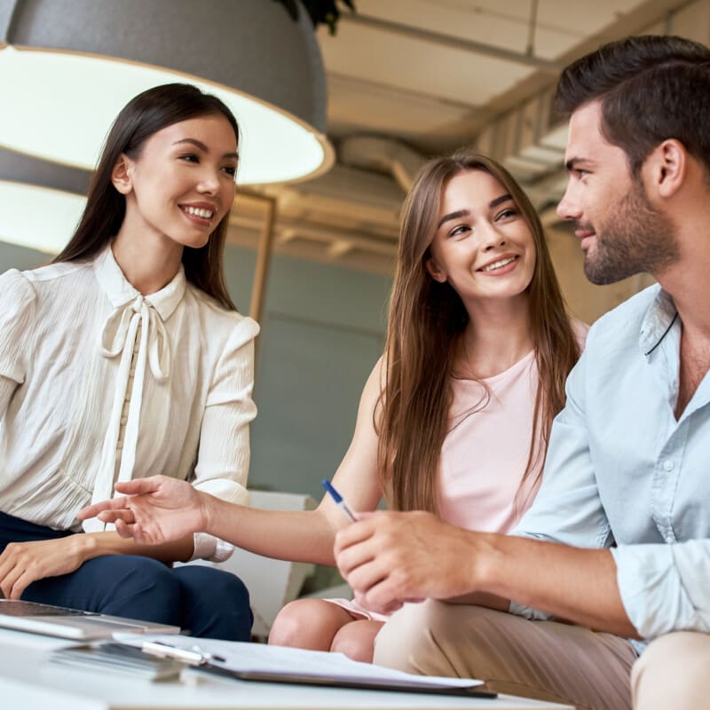 Couple touring Bellamere Winery wedding venue with gazebo in background