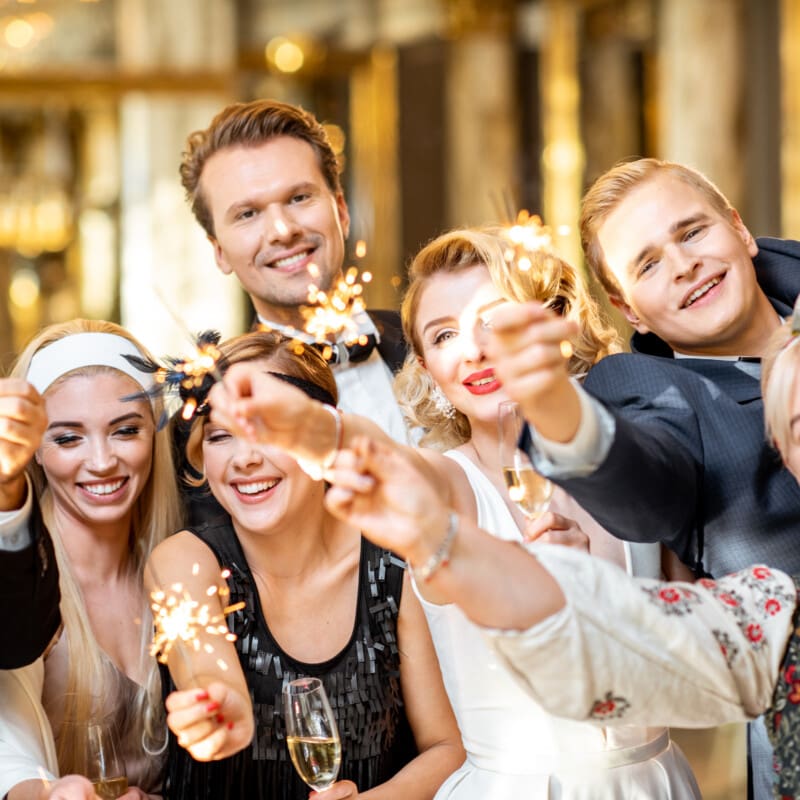 well-dressed-people-celebrating-new-year-indoors-2025-03-15-03-35-24-utc